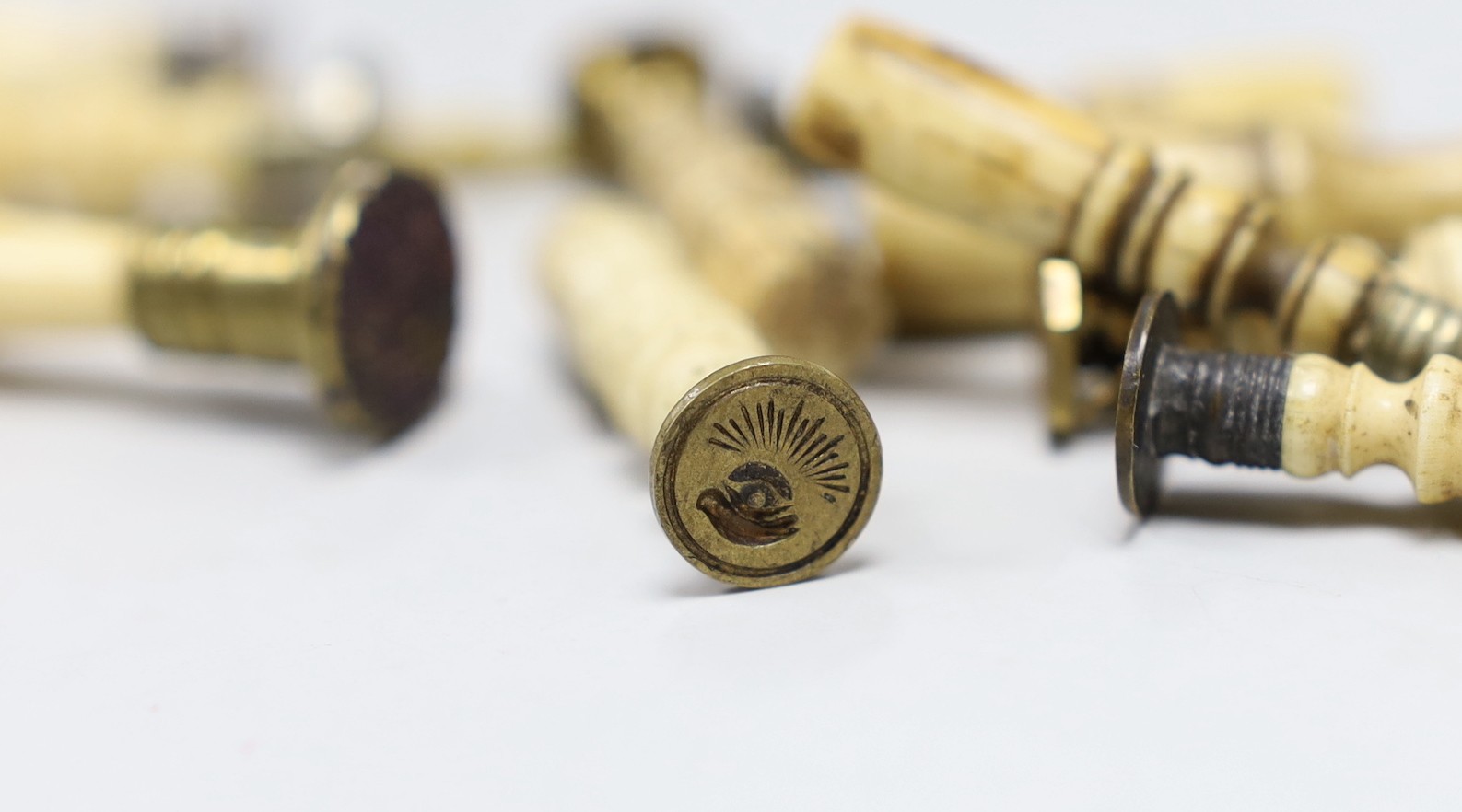 A group of approximately seventeen bone handled desk seals, 19th century and later